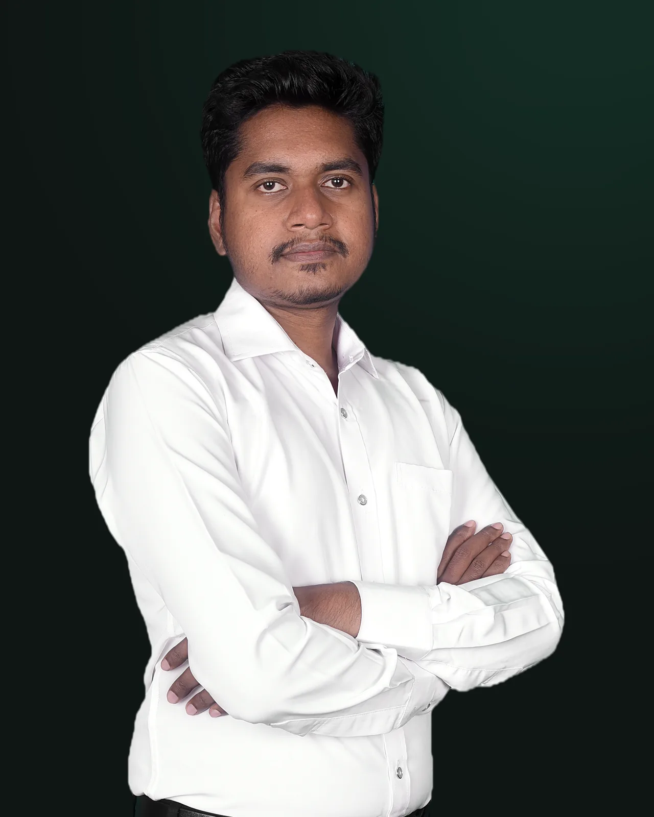 Portrait of Md Shahin Khan, freelance web developer, arms crossed, in a white shirt